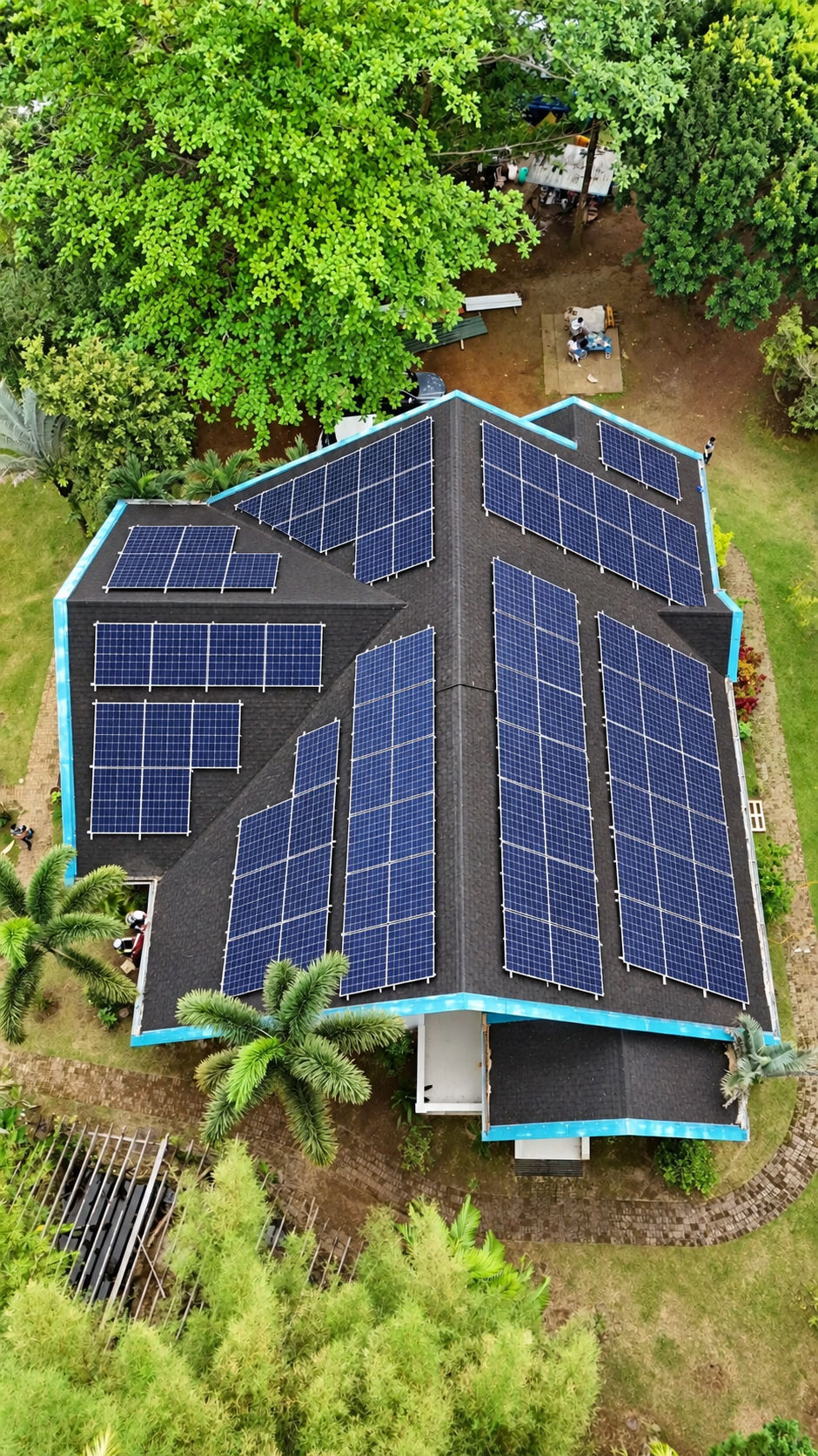 Rest house surrounded by trees with rooftop solar panels